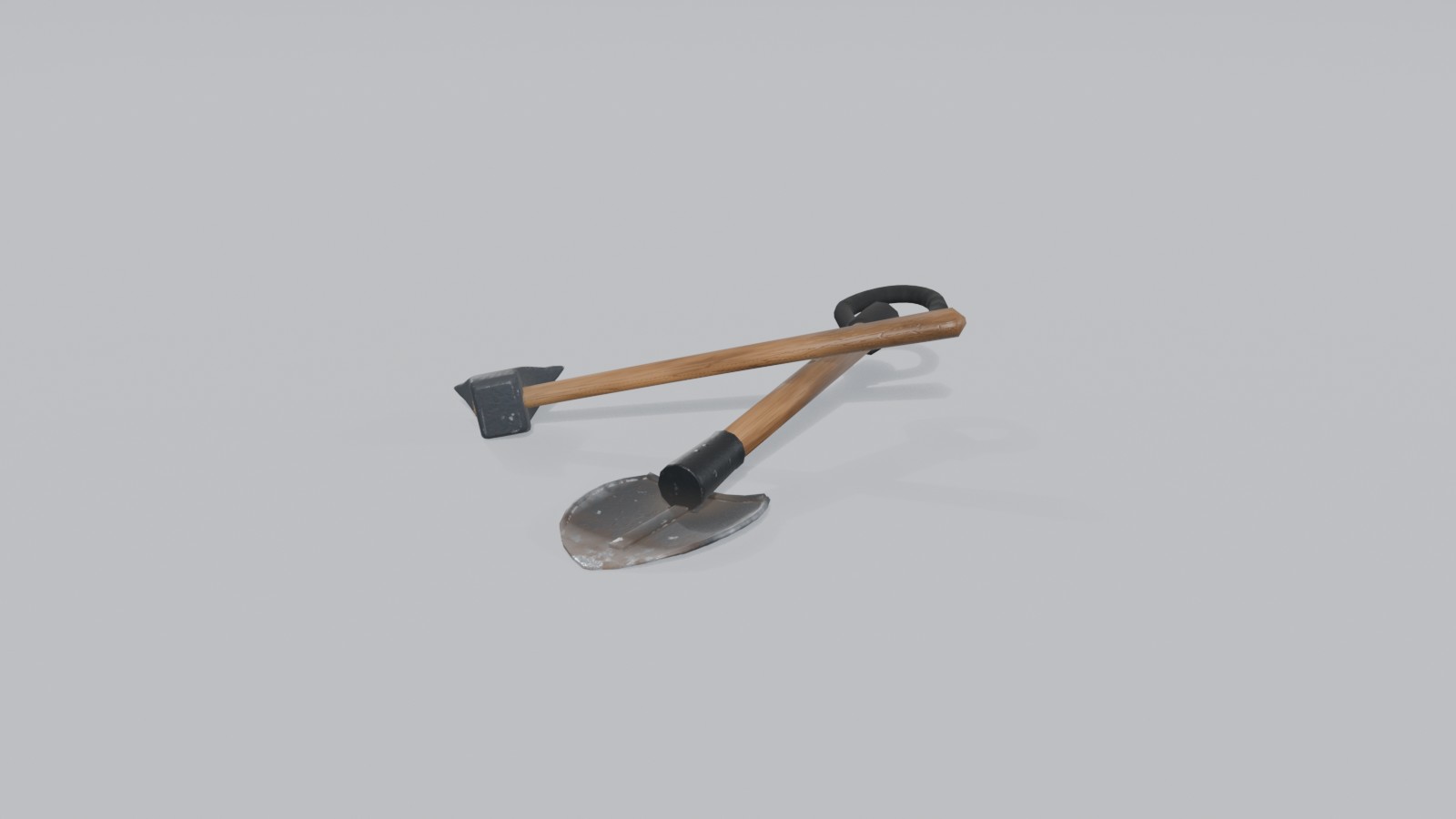 Camp axe and short shovel, crossed
